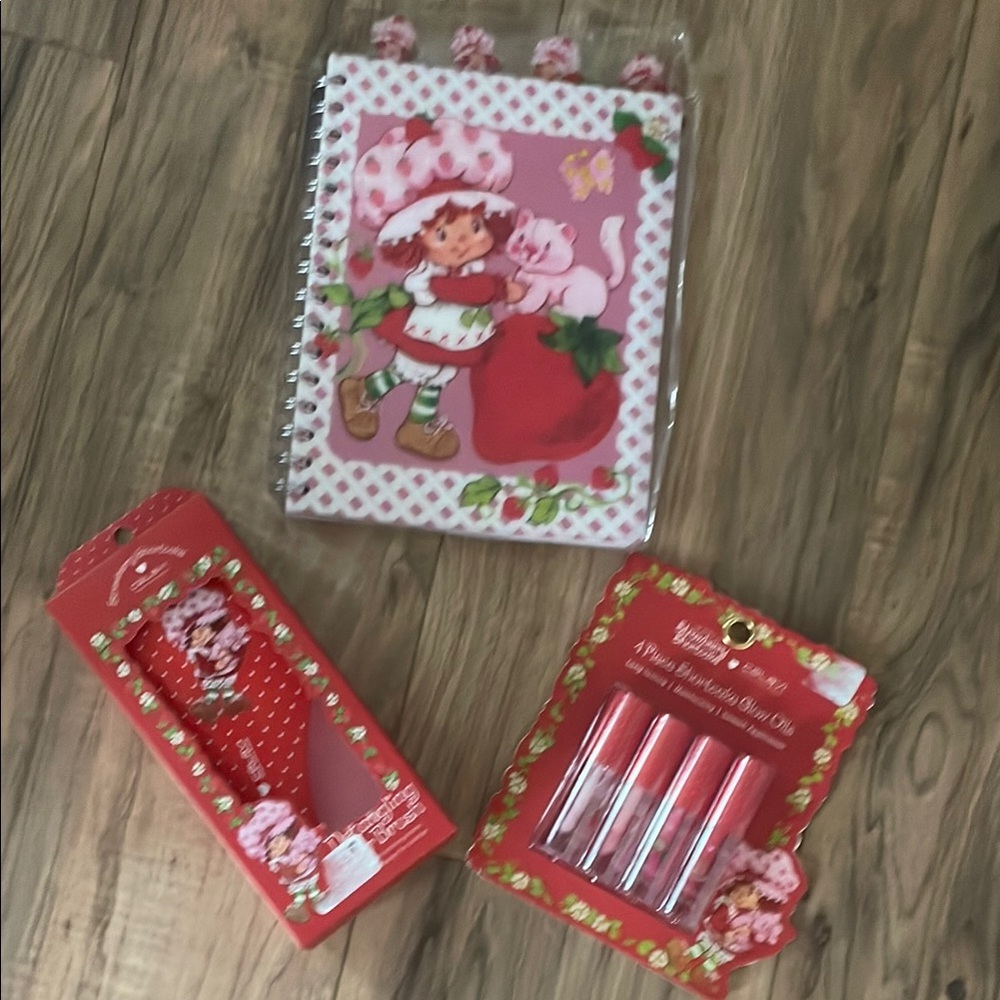 NWT strawberry shortcake bundle!! Jornal, brush, lip gloss set of 4